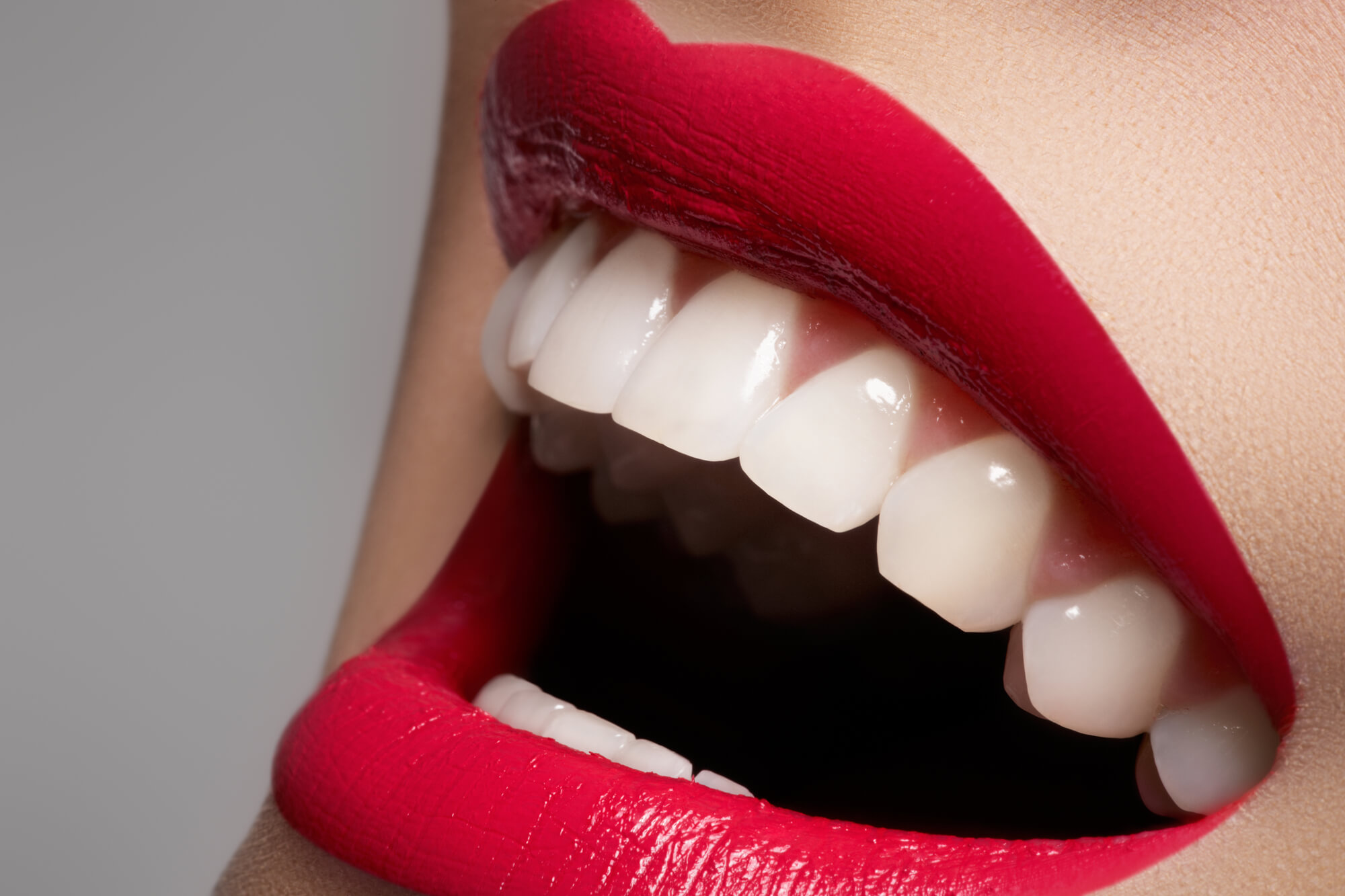 red lips and beautiful, white teeth