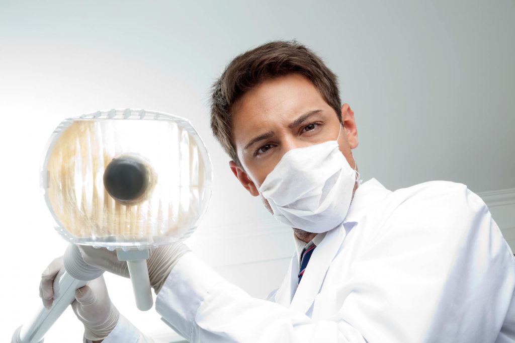 cosmetic dentist in Greenville SC checks dentist dental status