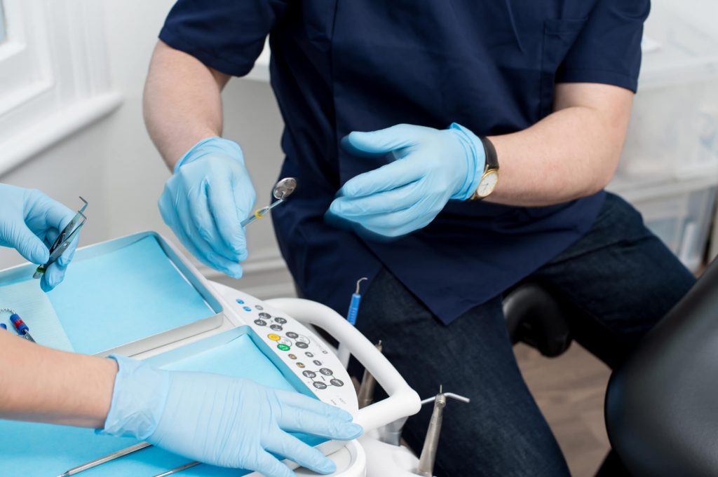 cosmetic dentist in Greenville SC prepares dental tools
