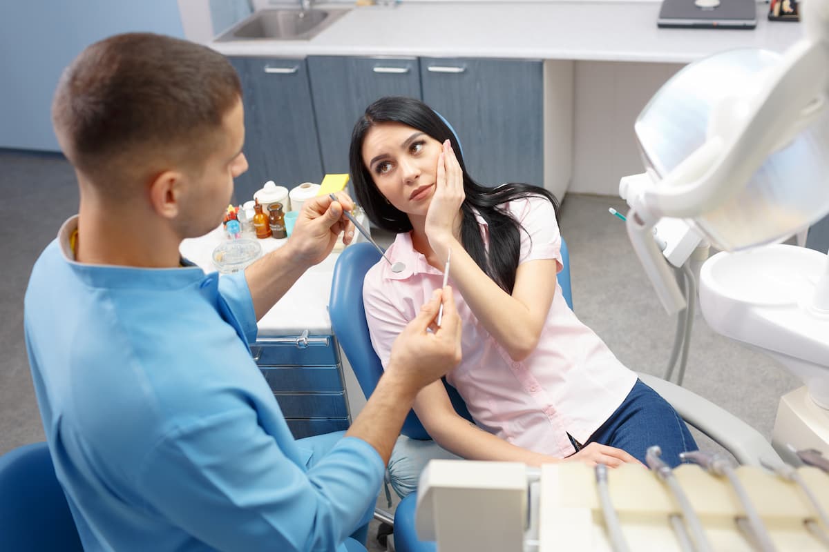 Woman preparing for tooth extractions in Greenville SC
