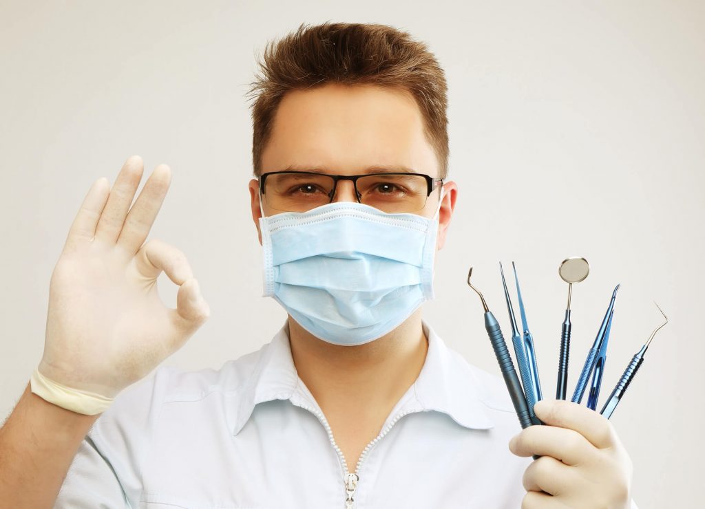 dentist gives an okay sign on oral surgery in Simpsonville, SC
