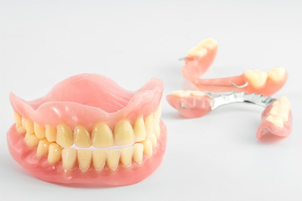 Full or partial dentures, visit your dentist in Greenville SC
