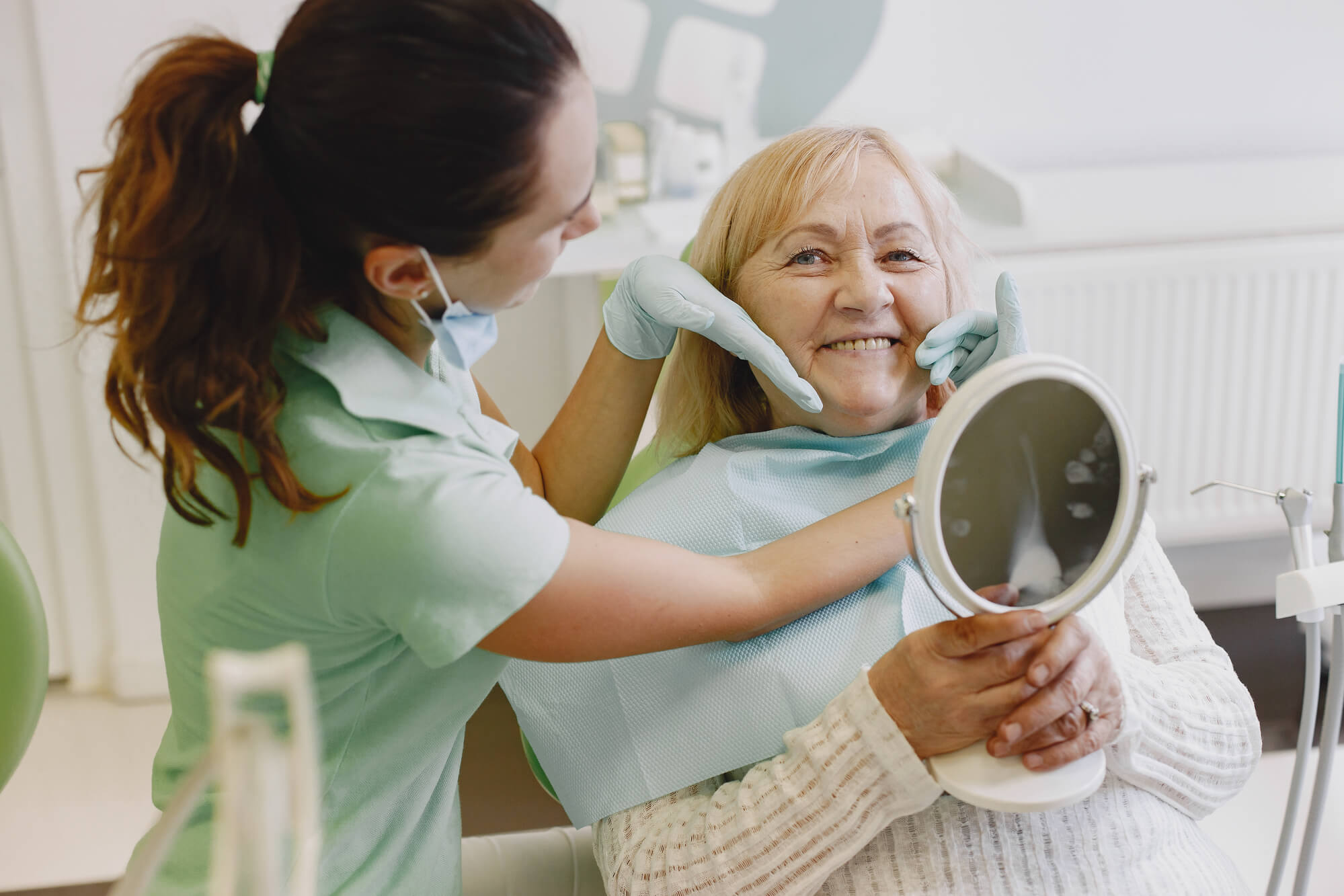 a dentist discussing painful Wisdom Teeth in Greenville SC