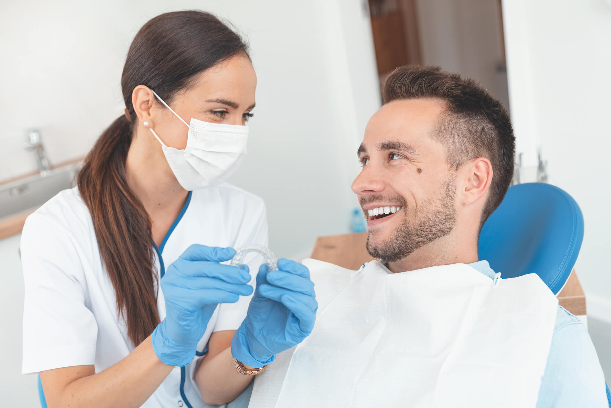 patient and dentist during appointment for Invisalign in Simpsonville SC